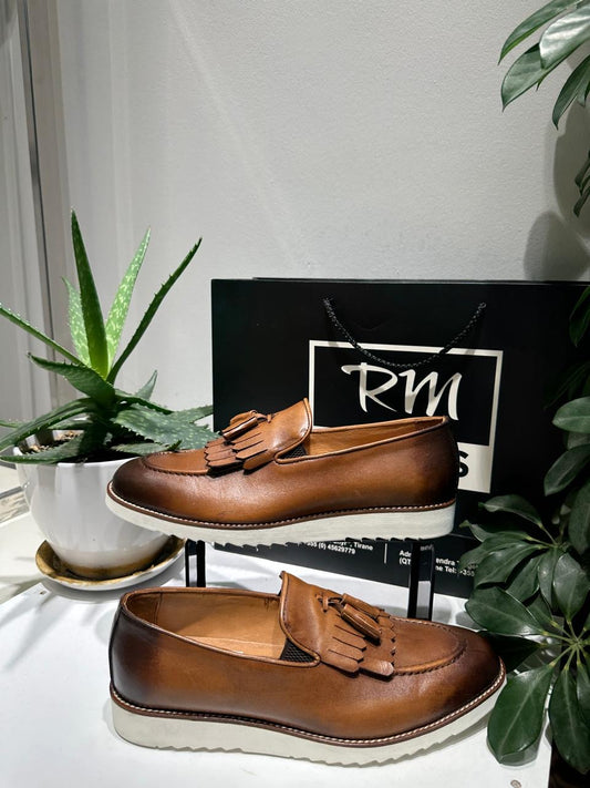 Mokasino per meshkuj