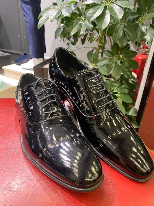 Kepuce klasike per meshkuj